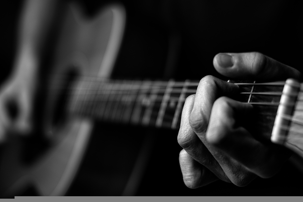 Playing Acoustic Guitar
